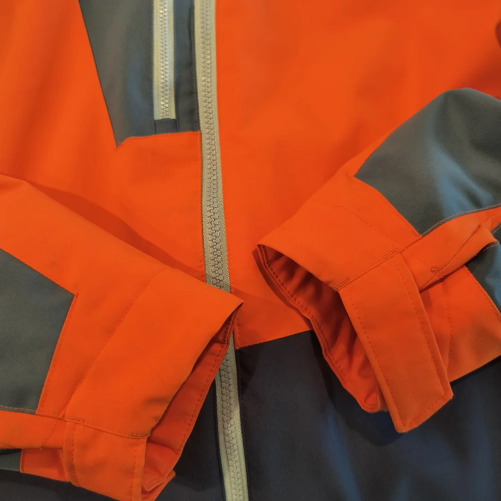 Spyder Orange and Blue Jacket with Black Pants - Picture 12 of 12
